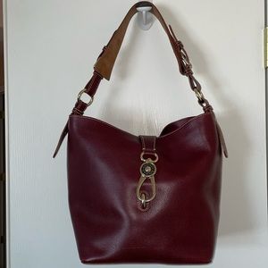 Dooney & Bourke beautiful dark Maroon leather bag. In great condition.